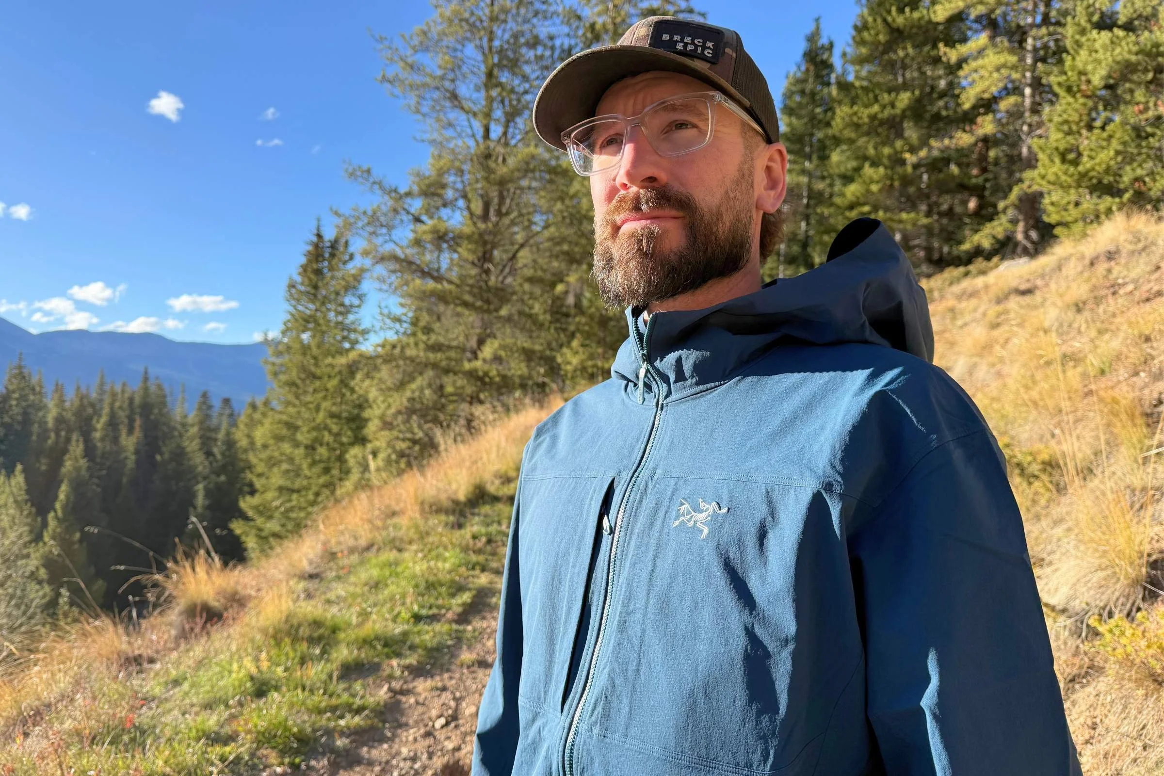 Detail shot of high-set chest pockets on a technical softshell jacket.