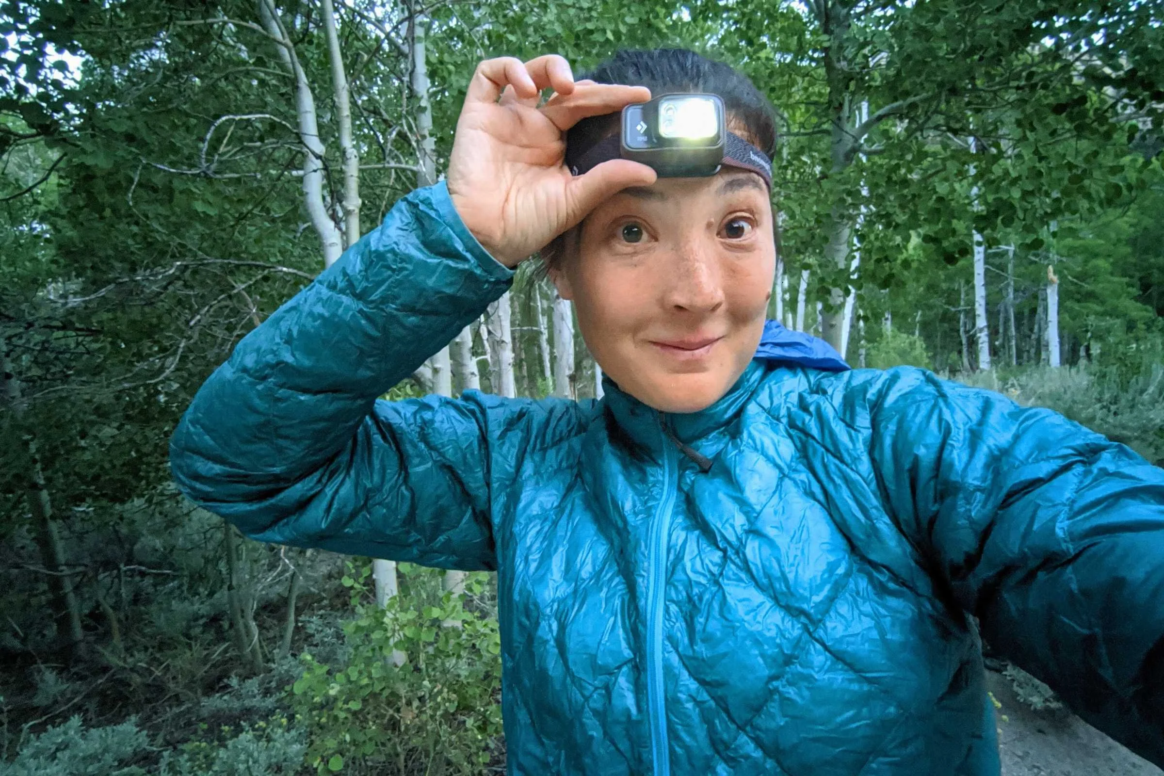 Author Liz Thomas demonstrating how to operate the buttons on the Black Diamond Spot 400.