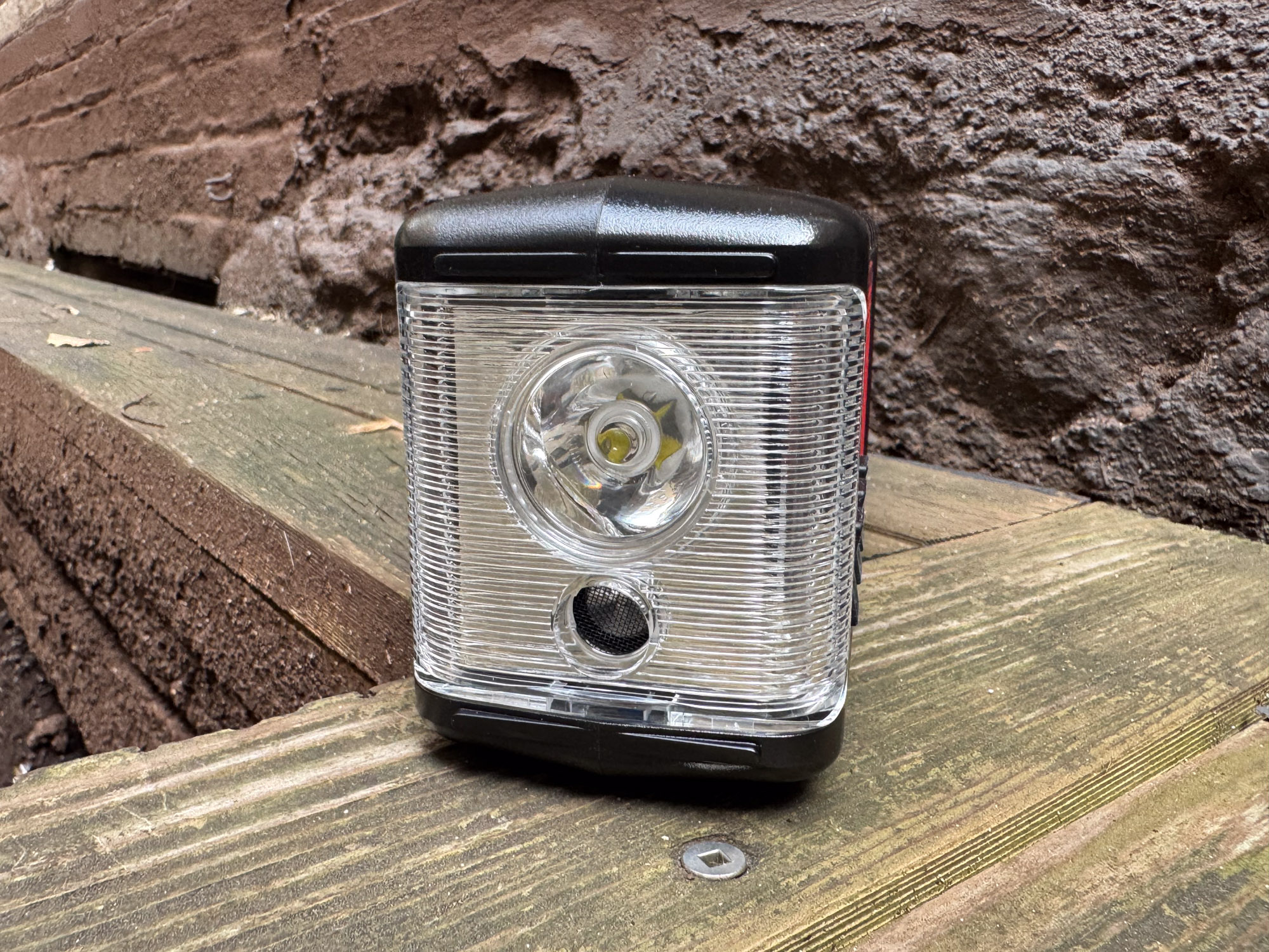 Close-up of the front-facing Cree LED flashlight on the ER310PRO radio.