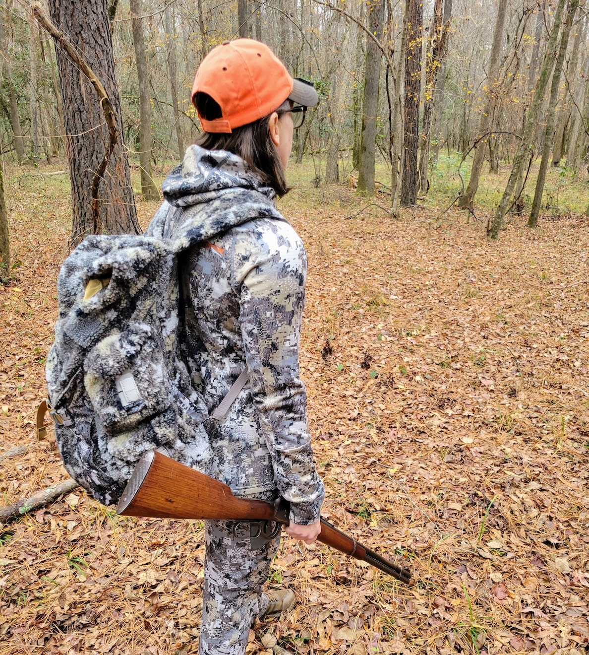 Sitka Fanatic quiet backpack hanging from a tree in a hunting stand.