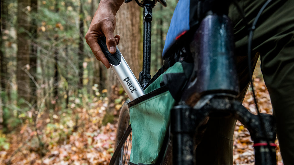 The compact PACT Lite Kit including a trowel and waste bags.