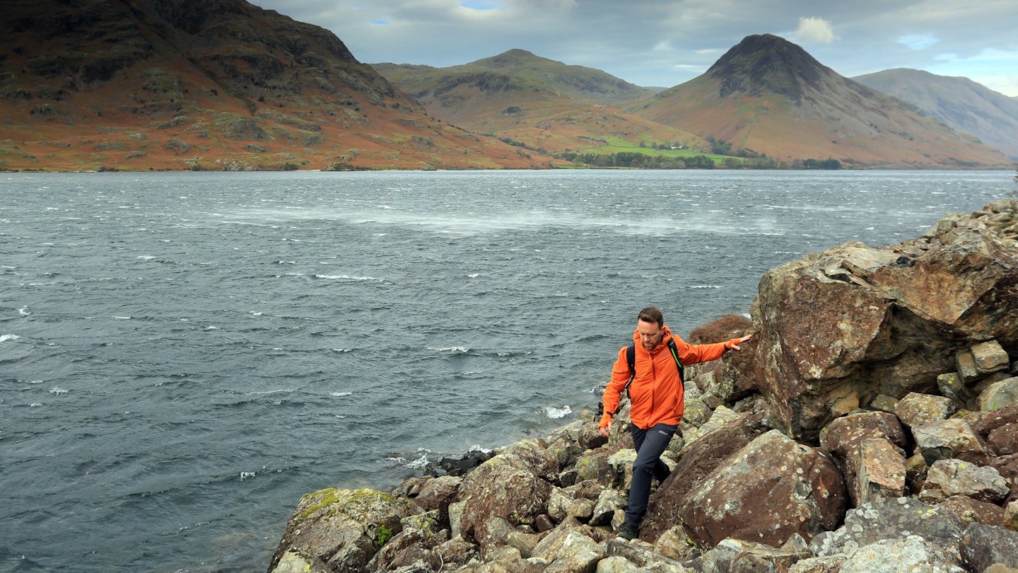 Gear expert James Forrest testing outdoor equipment in steep mountain terrain.