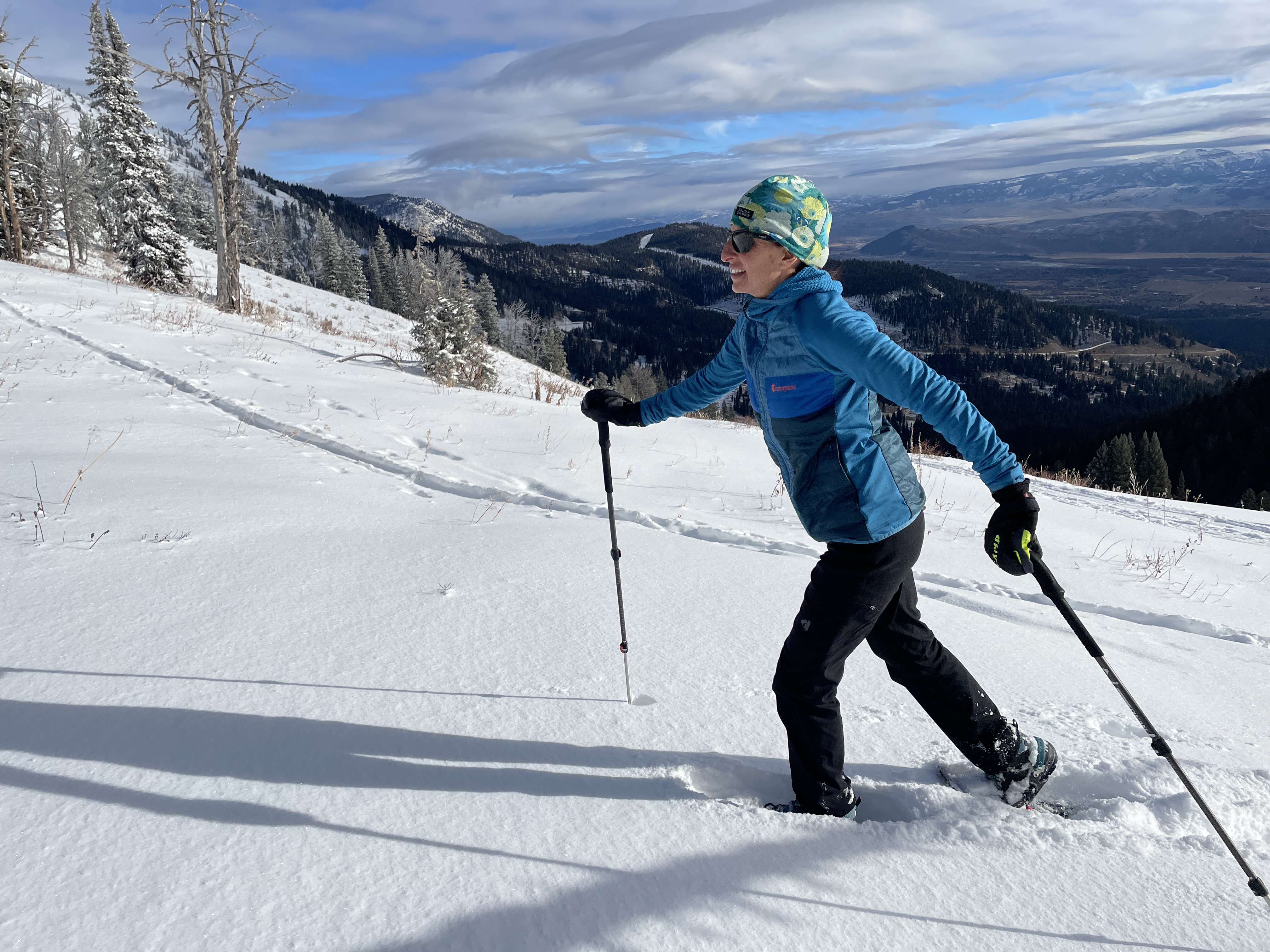 The colorful Cotopaxi Capa Hybrid Insulated Hooded Jacket