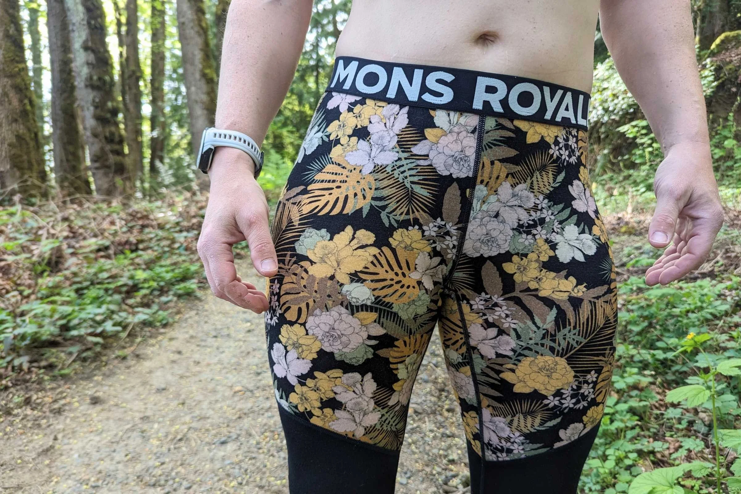 Front view of a woman wearing high-waisted patterned merino leggings.