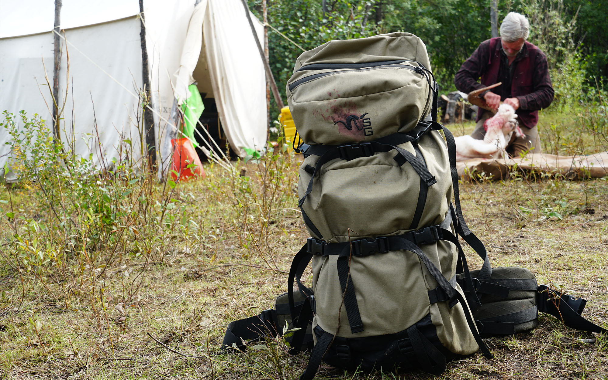 A Stone Glacier hunting backpack resting at a remote hunt camp.