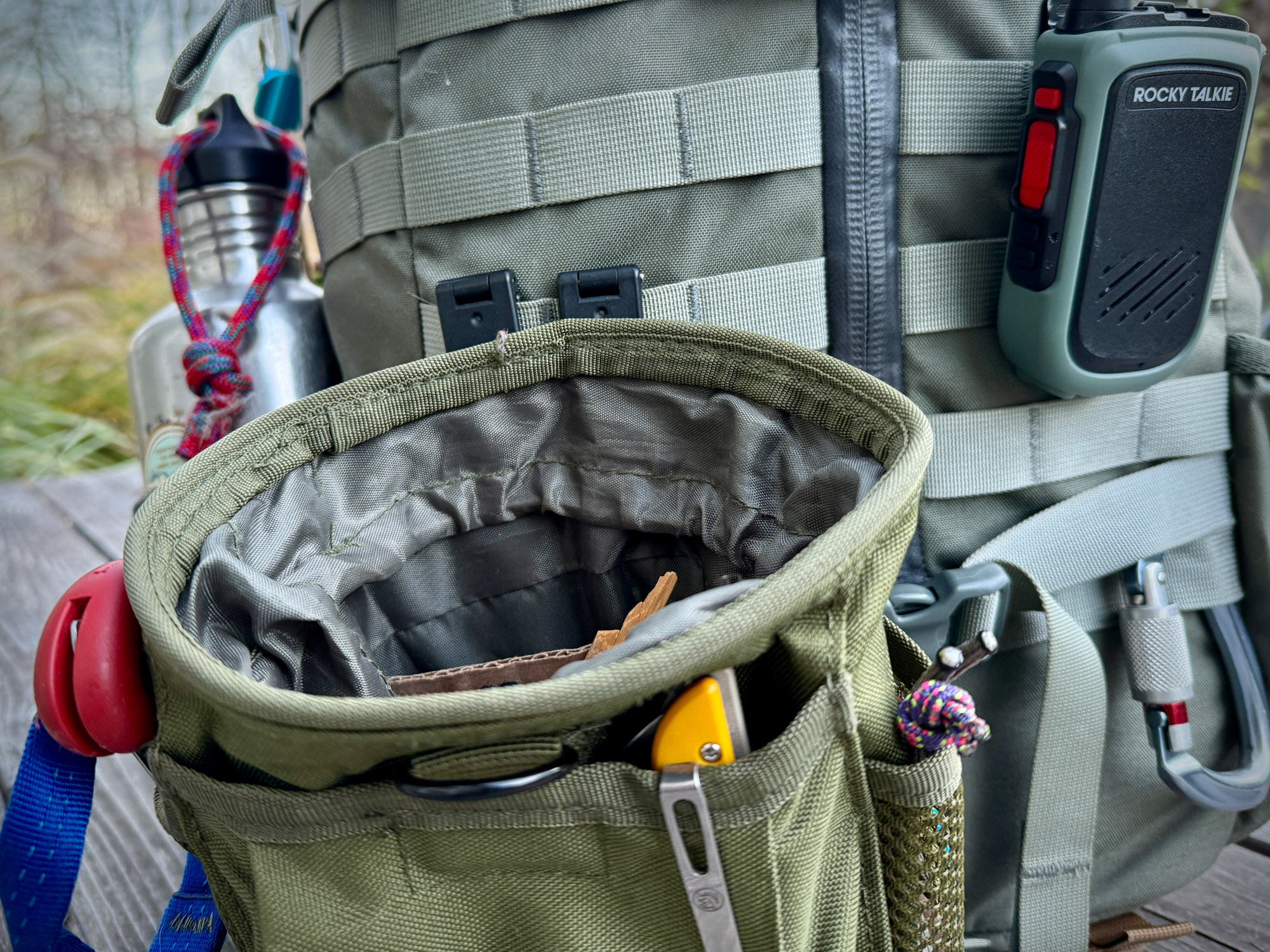 Detailed view of horizontal MOLLE webbing straps on a tactical backpack