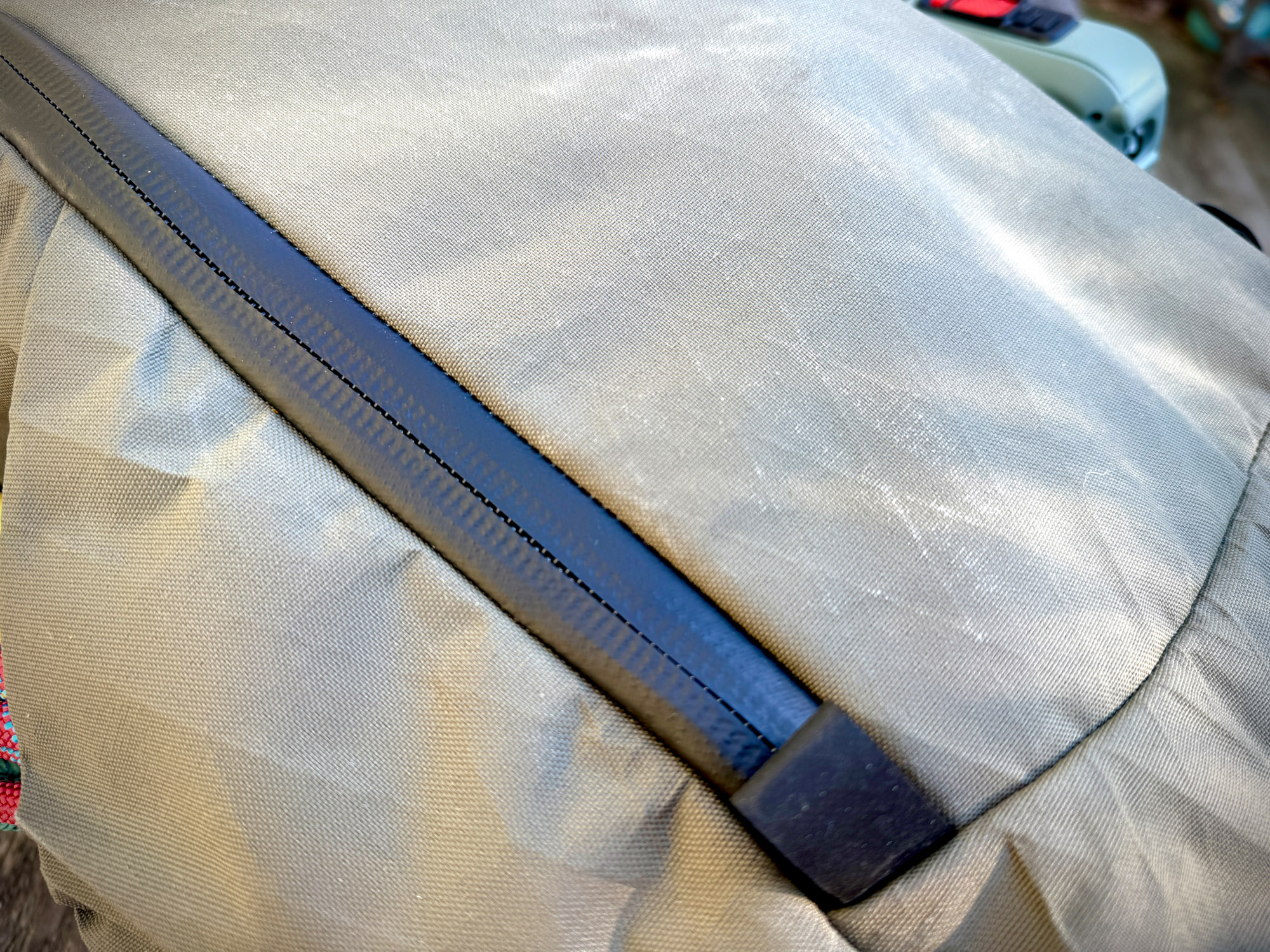 Extreme close-up of high-denier Cordura fabric weave on a backpack