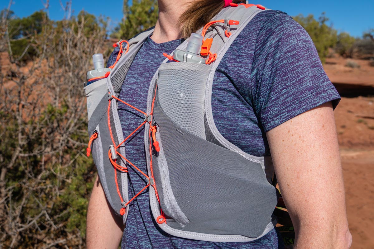 Close-up of a zippered phone pocket on a hydration vest.