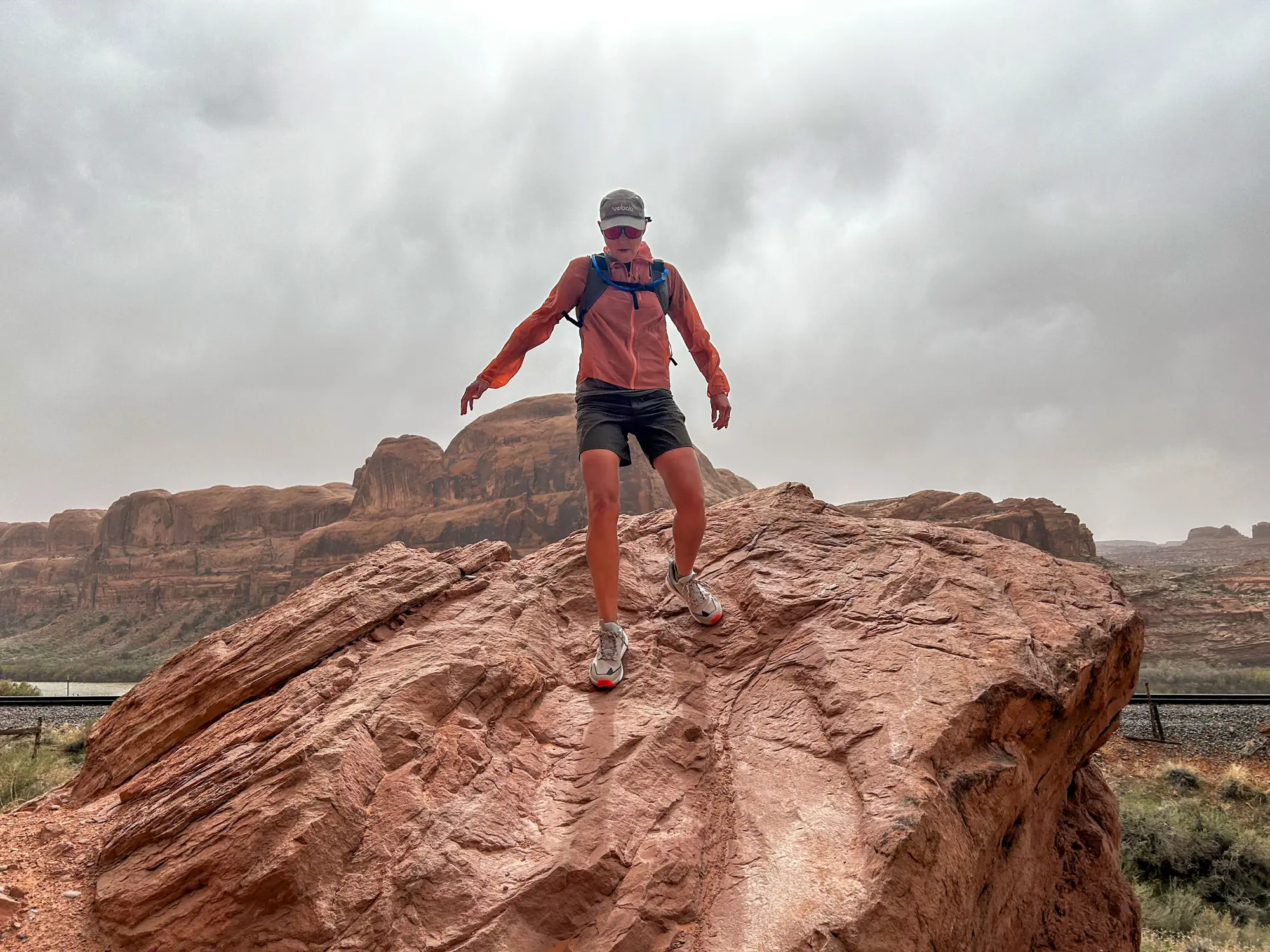 A hiker wearing Adidas Terrex Free Hiker 2 Low shoes on a trail.